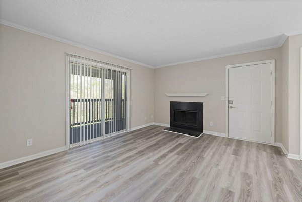 Spacious living room with modern decor at Madison at Adams Farm Apartments
