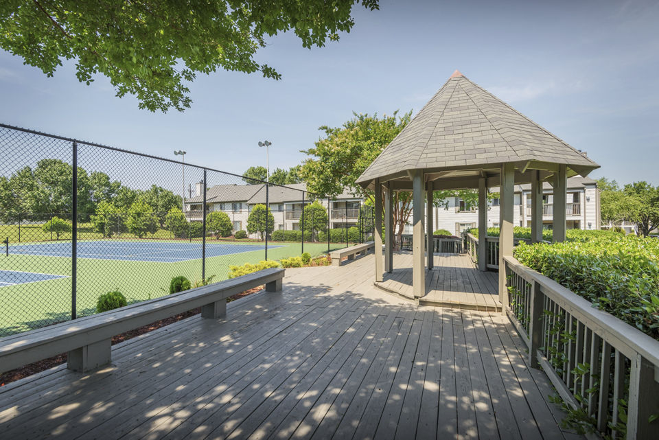 Sport court for tennis and basketball at Madison at Adams Farm Apartments, offering recreational opportunities for active residents