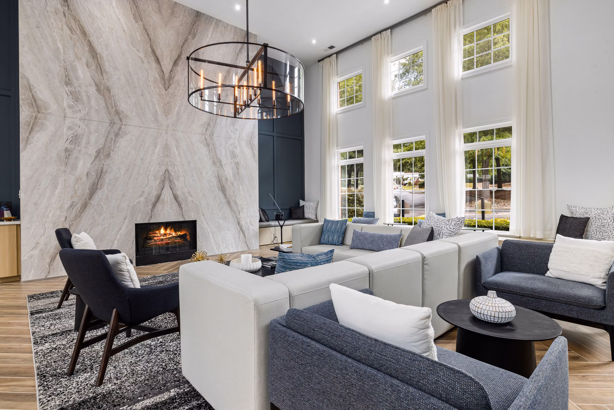 Mariners Crossing: Elegant clubhouse featuring modern furnishings and stylish decor at luxury apartments in serene surroundings
