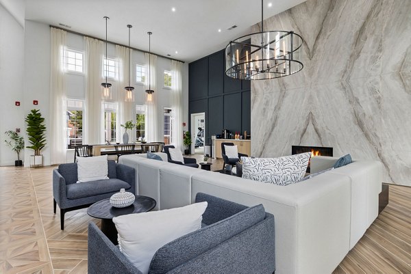 Clubhouse with modern furnishings at Mariners Crossing Apartments featuring social spaces and leisure areas