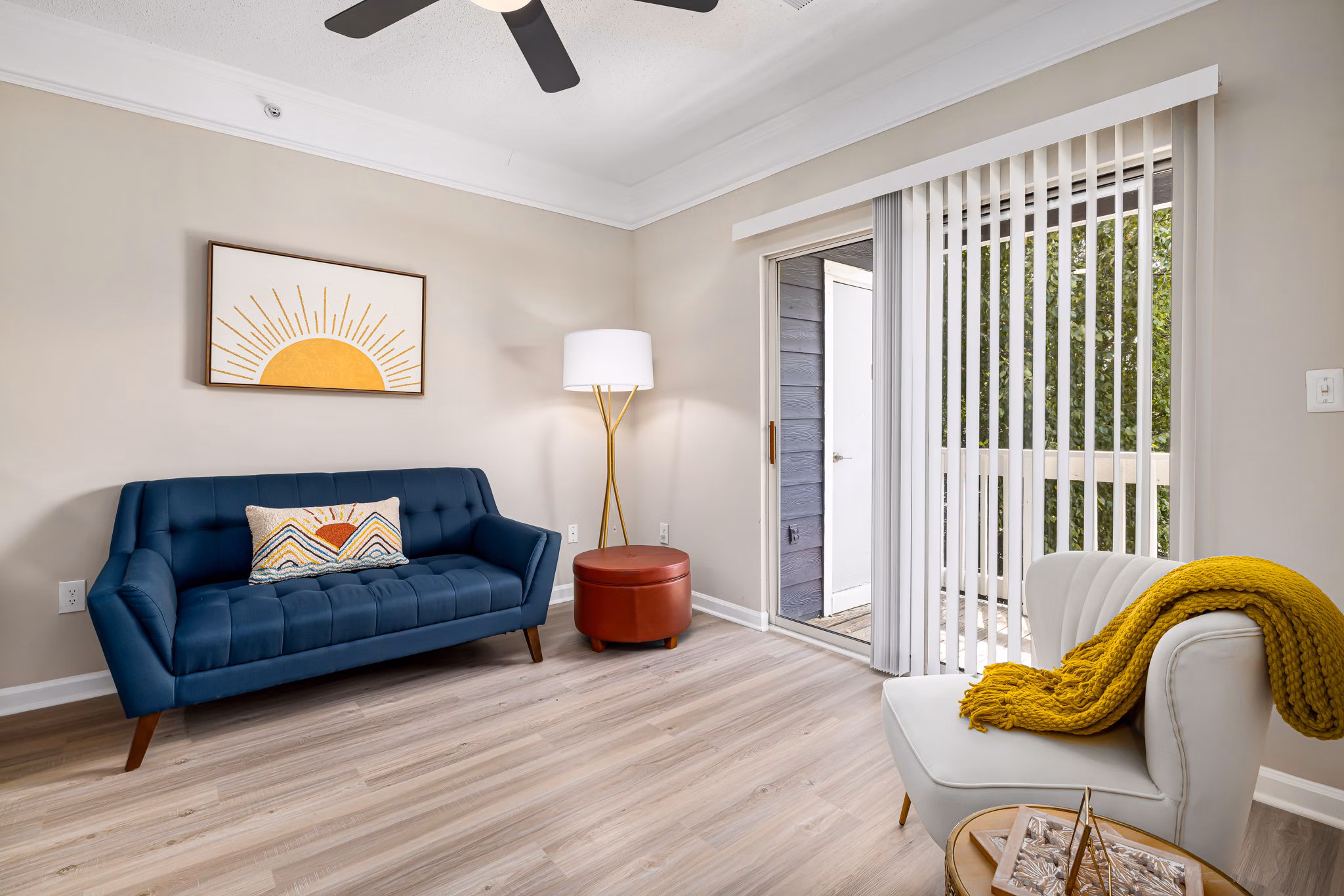 Living room with modern furnishings at Mariners Crossing Apartments