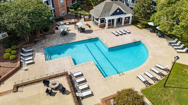Luxurious pool with lounge seating at Mariners Crossing Apartments, ideal for relaxation and community events