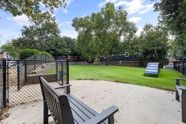Dog park with agility equipment at Mariners Crossing Apartments