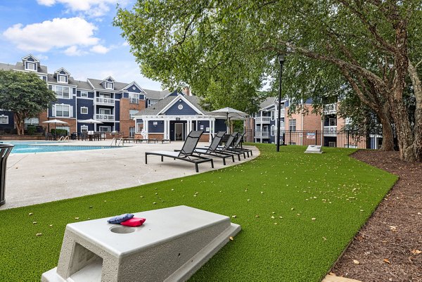 Serene courtyard with landscaped gardens at Mariners Crossing Apartments