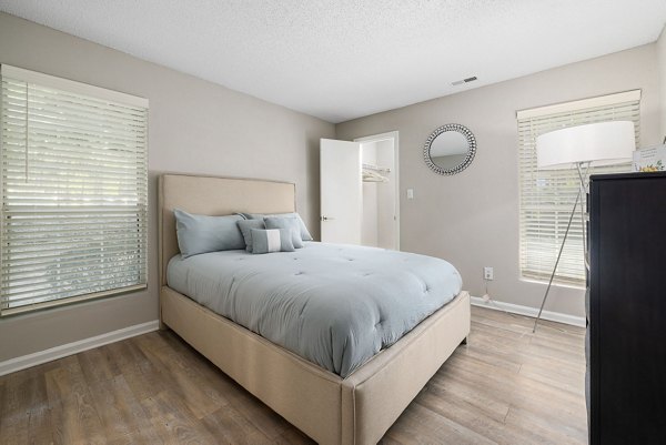 Spacious bedroom with modern decor at View at Lake Lynn Apartments