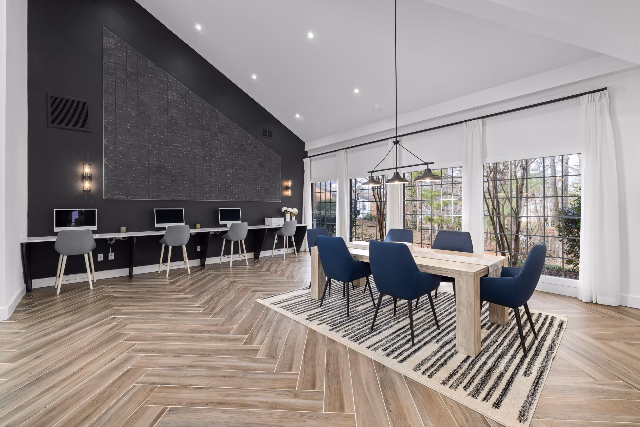 Modern clubhouse with cozy seating and billiards table at View at Lake Lynn Apartments