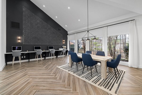 Modern clubhouse with cozy seating and billiards table at View at Lake Lynn Apartments