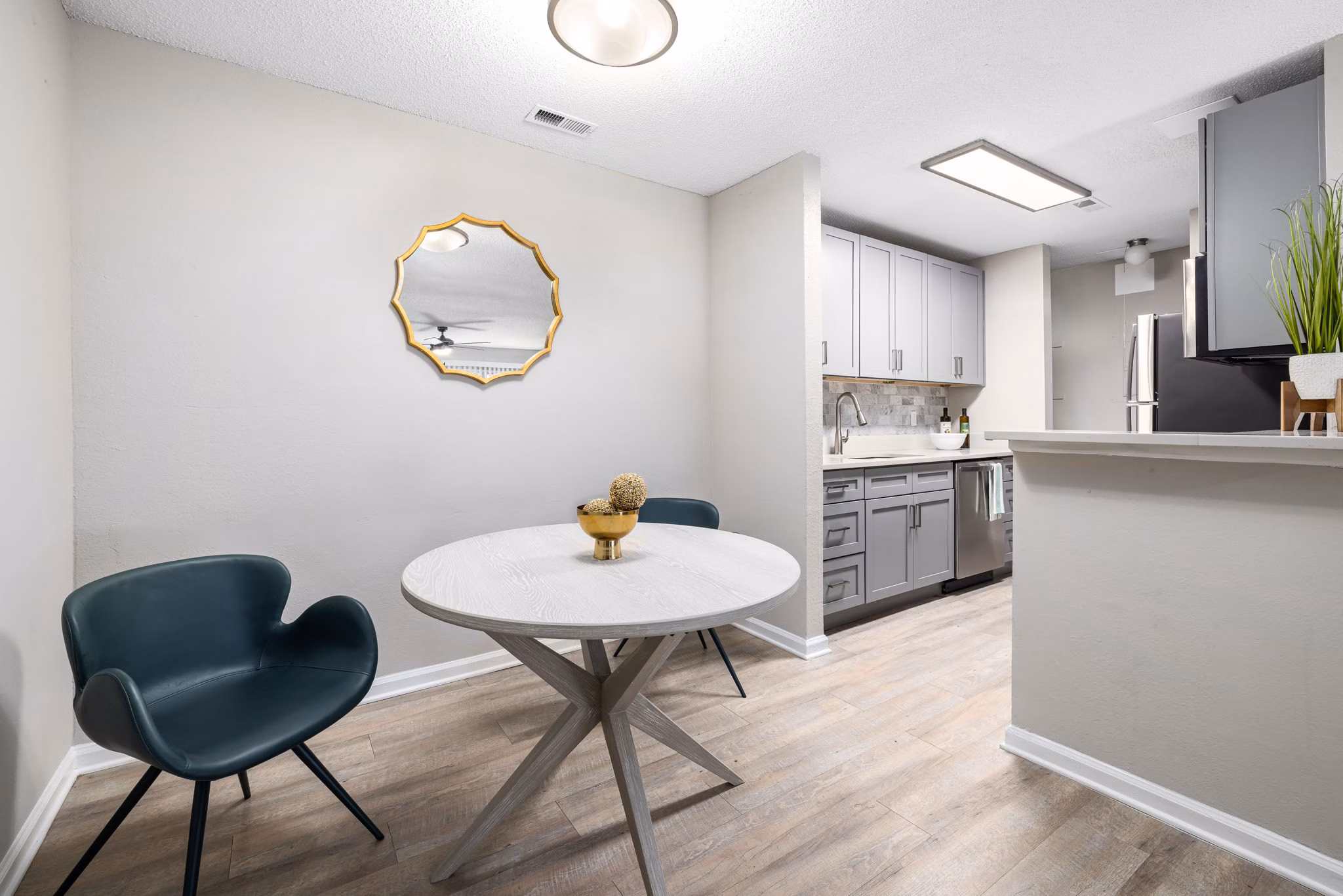 Elegant dining area with modern decor and natural light in View at Lake Lynn Apartments