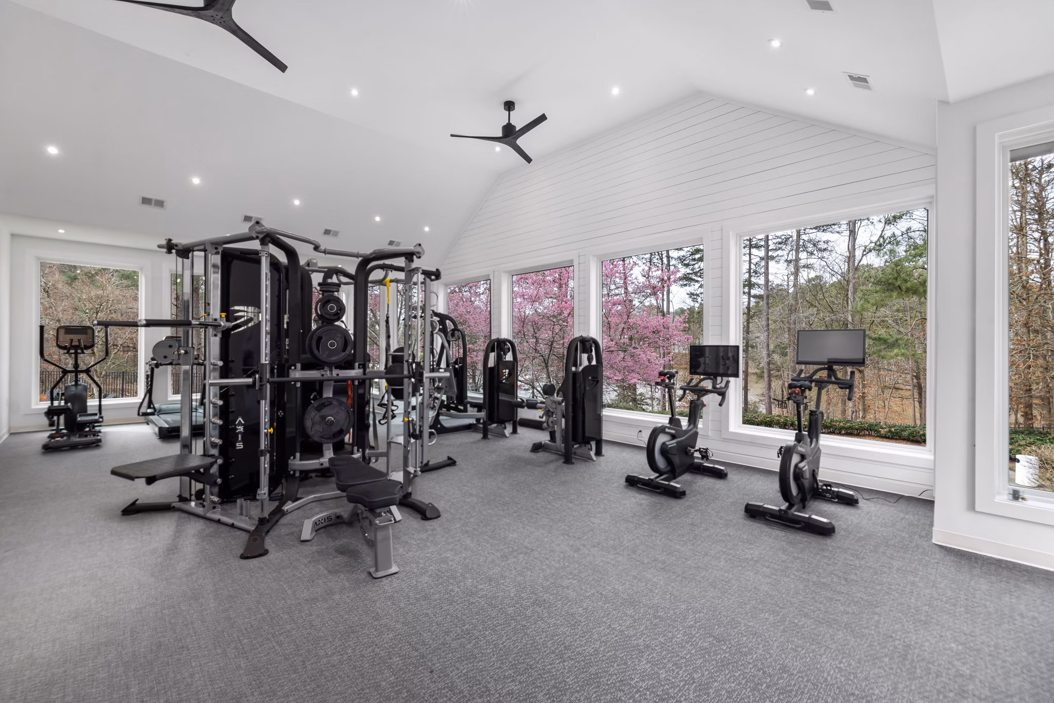 Modern fitness center with state-of-the-art gym equipment at View at Lake Lynn Apartments offering luxury amenities