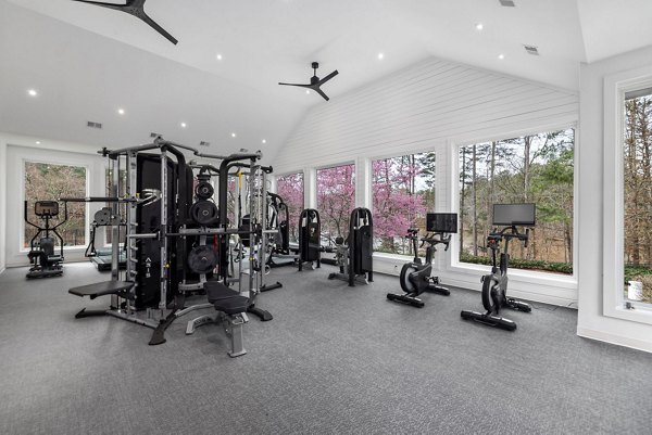 Modern fitness center with state-of-the-art gym equipment at View at Lake Lynn Apartments offering luxury amenities