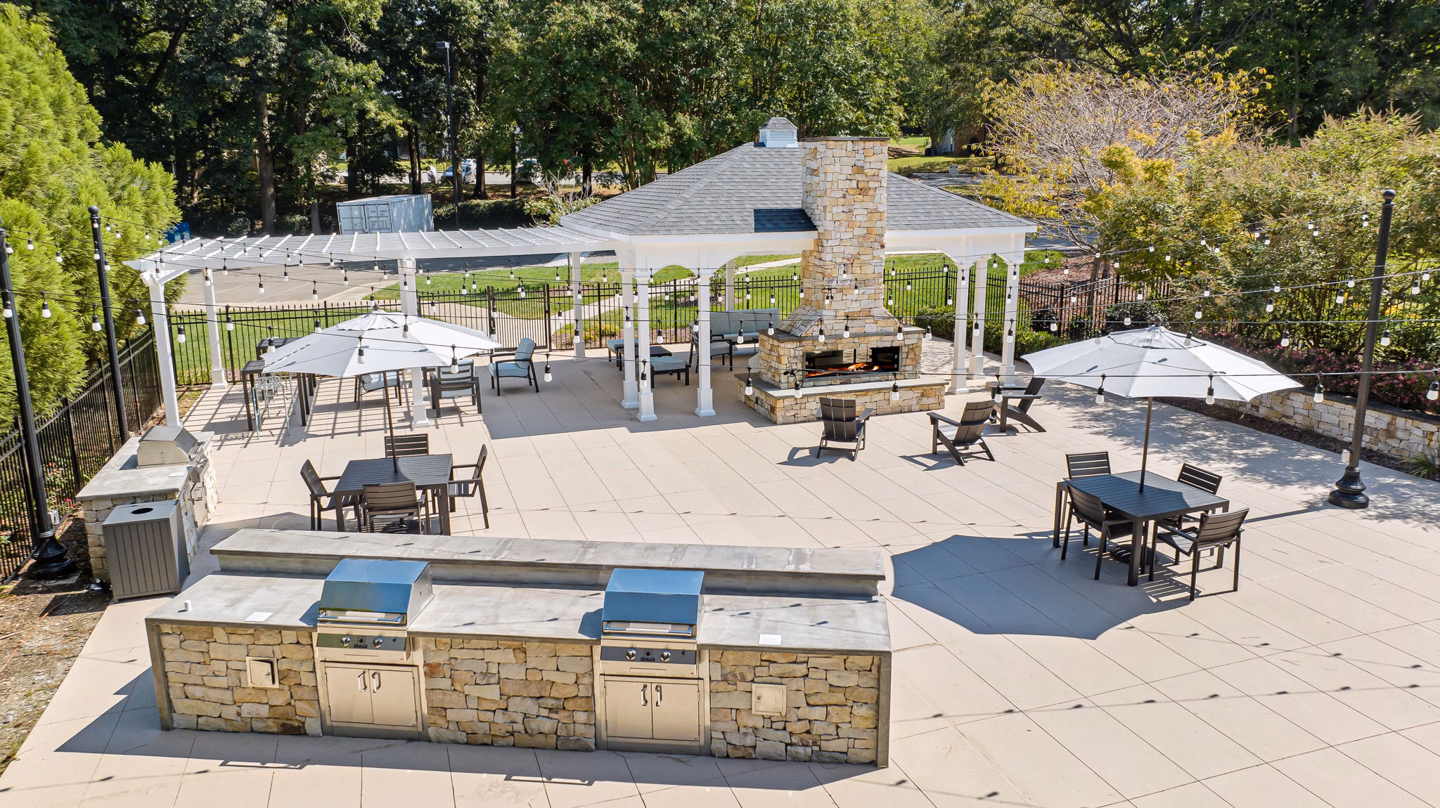 Courtyard at View at Lake Lynn Apartments: Inviting outdoor space with lush greenery and seating areas
