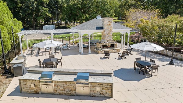Courtyard at View at Lake Lynn Apartments: Inviting outdoor space with lush greenery and seating areas