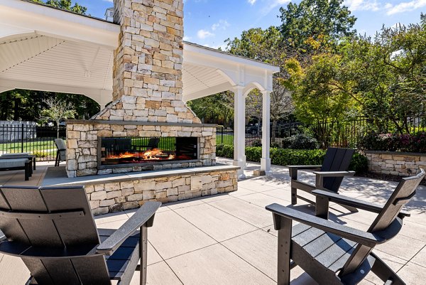 Fire pit area with cozy seating at View at Lake Lynn Apartments, providing a relaxing outdoor amenity for social gatherings