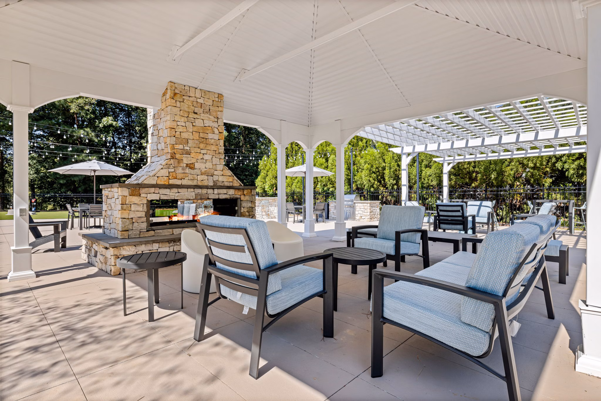 Outdoor patio with modern furnishings at View at Lake Lynn Apartments