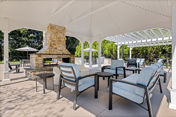 Outdoor patio with modern furnishings at View at Lake Lynn Apartments
