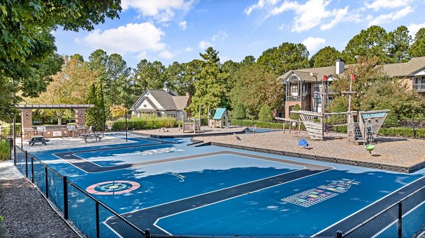 Sports court with lush surroundings at View at Lake Lynn Apartments, offering recreational opportunities