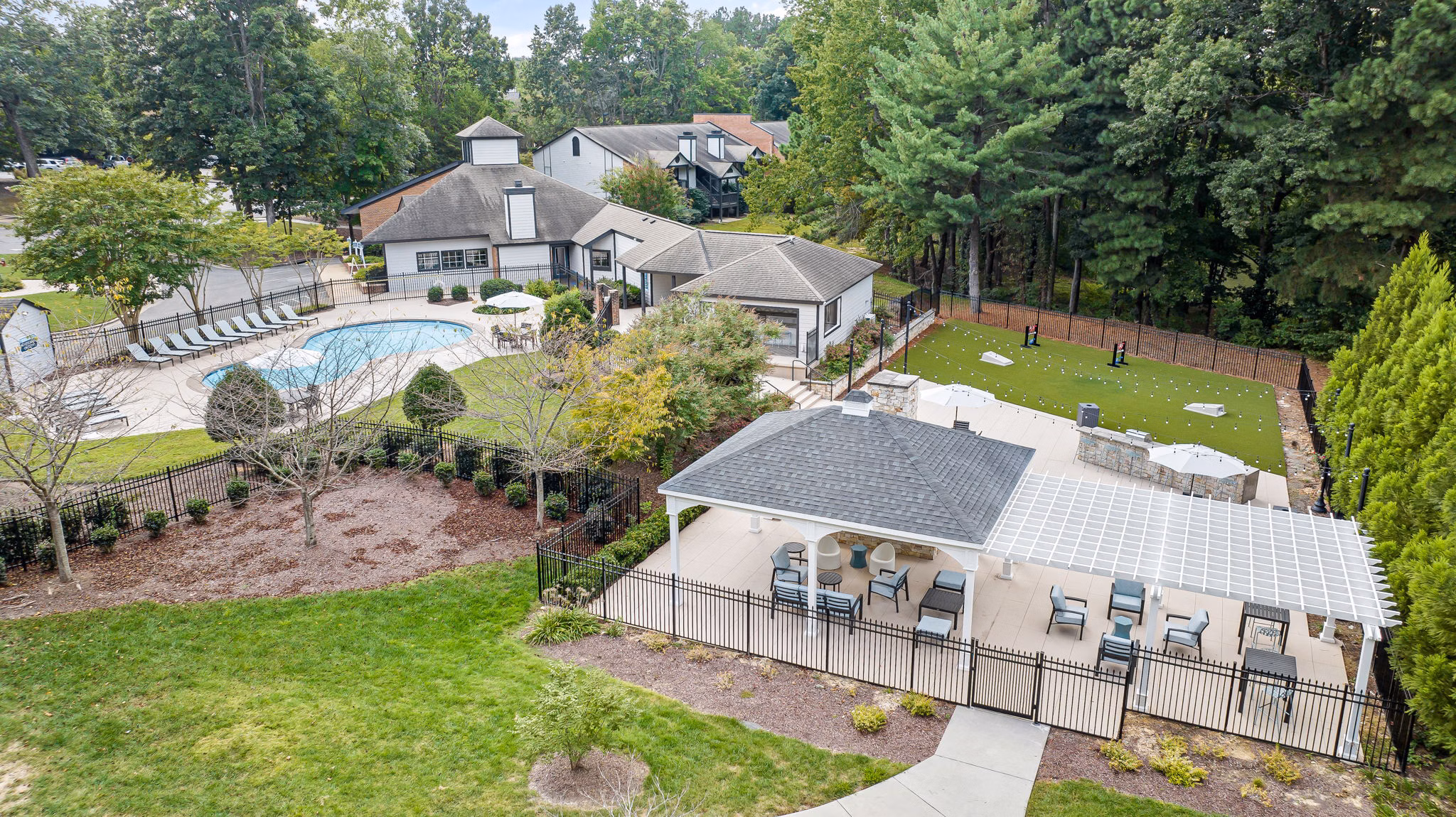 View at Lake Lynn Apartments: Scenic property view with lakeside access in North Raleigh offering luxury living options
