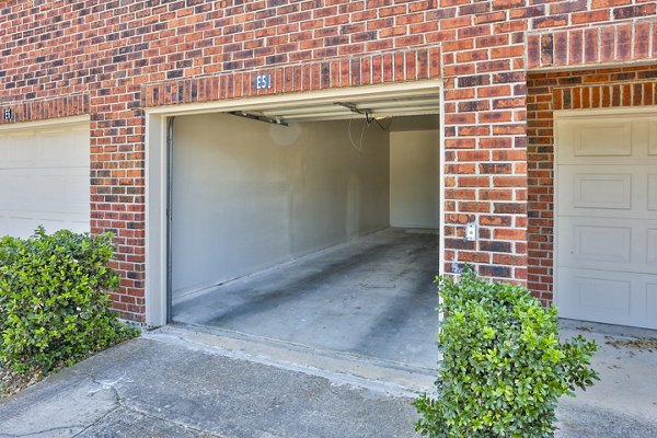 Secure covered parking garage at The Quarry Alamo Heights Apartments, ideal for residents seeking protected vehicle storage solutions