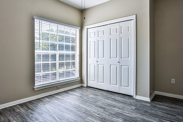 Cozy bedroom with modern furnishings at The Quarry Alamo Heights Apartments