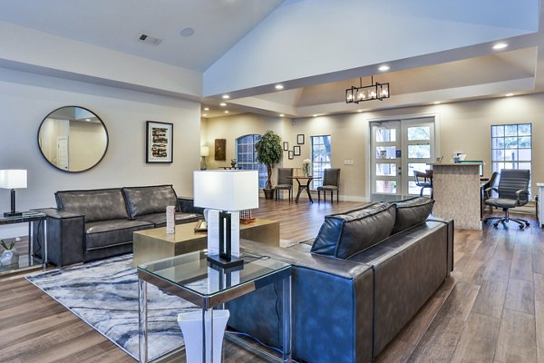 Clubhouse lobby featuring modern seating and elegant design at The Quarry Alamo Heights Apartments