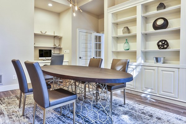 Clubhouse lobby featuring modern furnishings and open space at The Quarry Alamo Heights Apartments