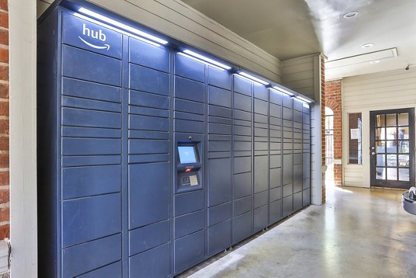 Clubhouse with modern parcel lockers at The Quarry Alamo Heights Apartments offering luxury living