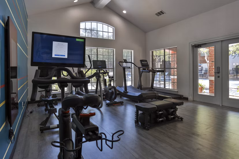 fitness center at The Quarry Alamo Heights Apartments