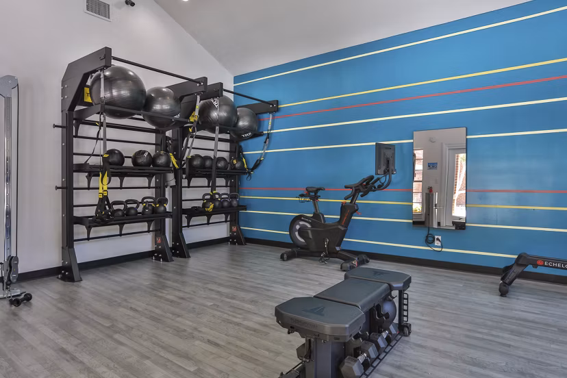 fitness center at The Quarry Alamo Heights Apartments