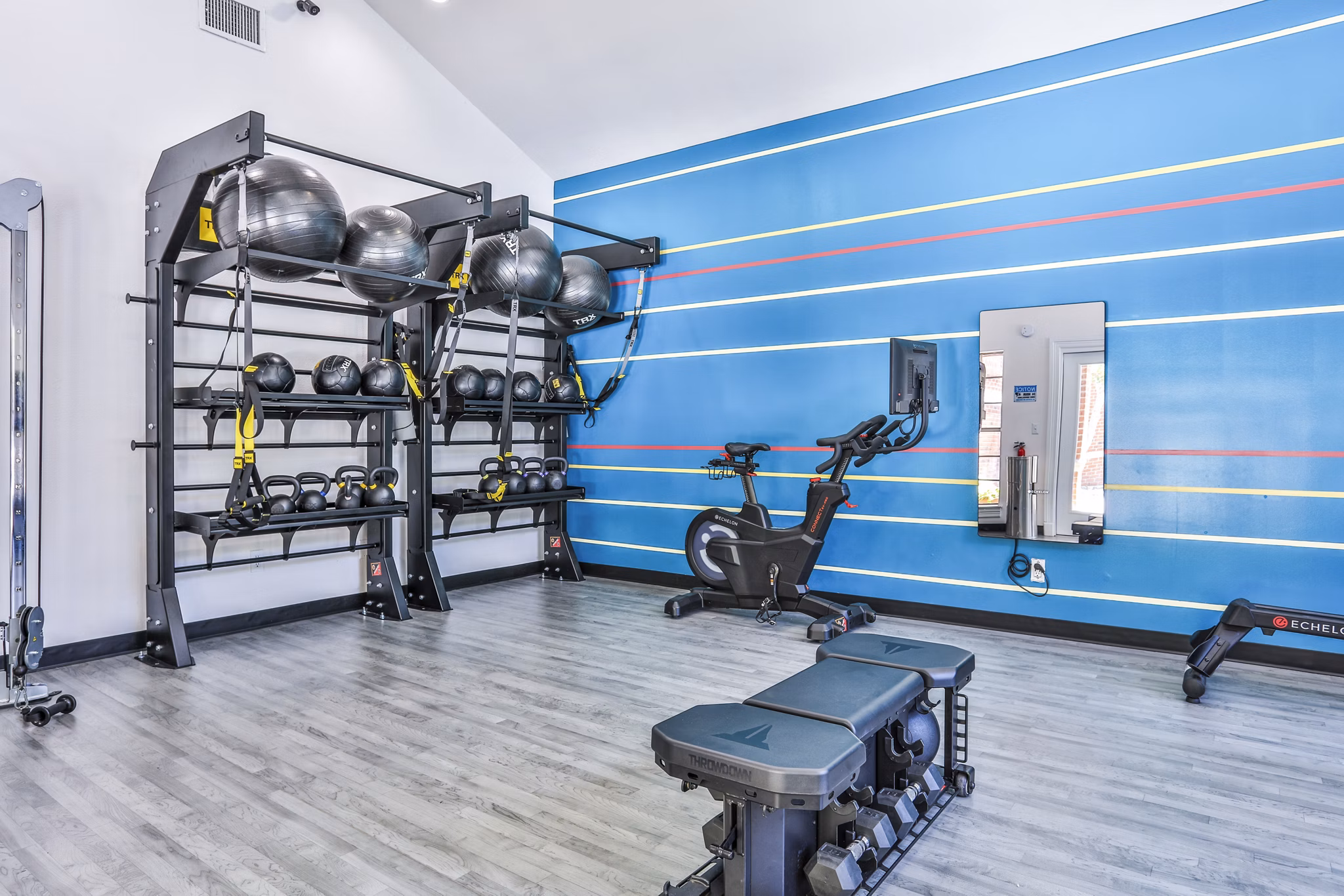State-of-the-art fitness center featuring modern equipment at The Quarry Alamo Heights Apartments, ideal for maintaining an active lifestyle