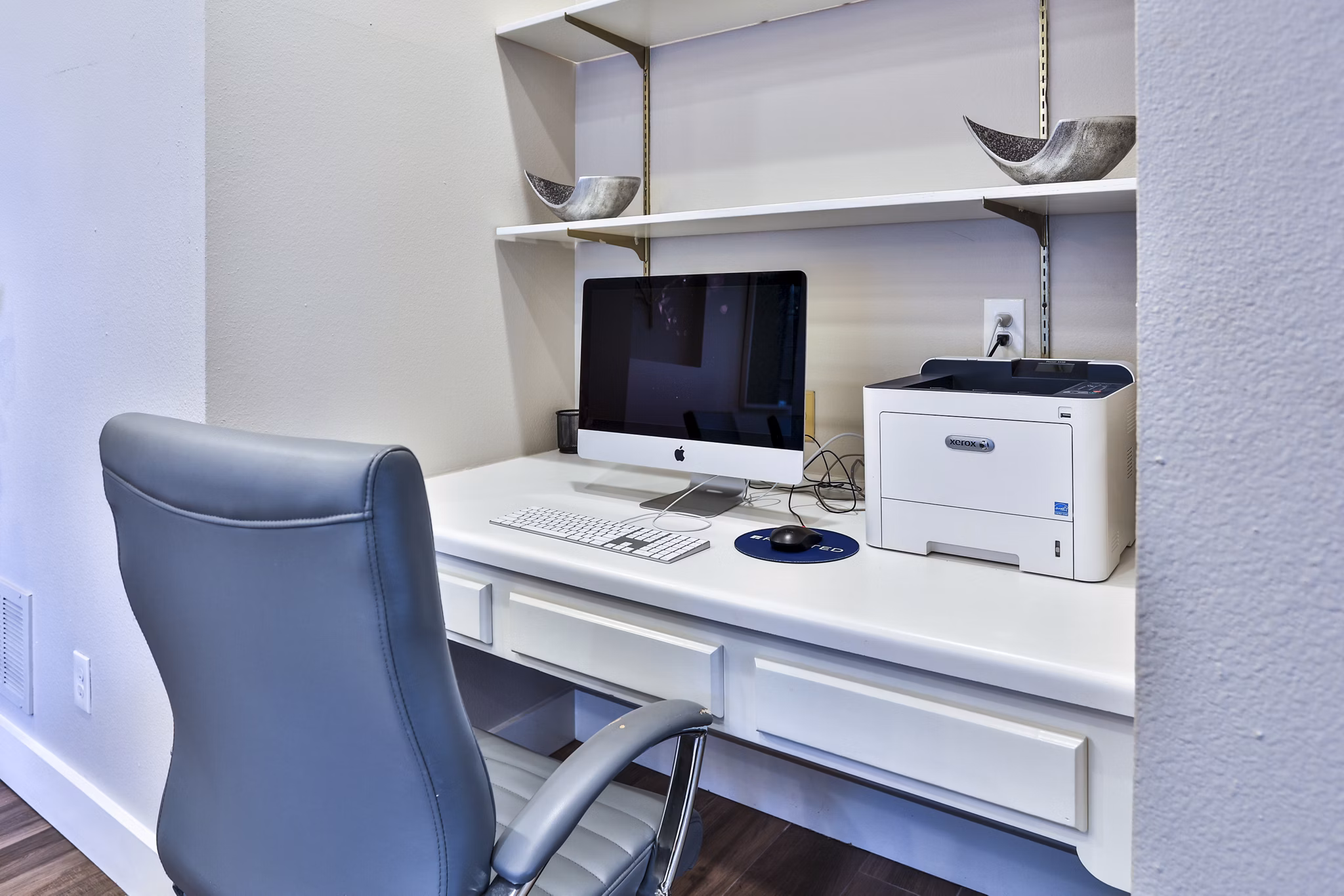 Home office area with modern design and ergonomic desk in The Quarry Alamo Heights Apartments, ideal for luxury work-from-home living