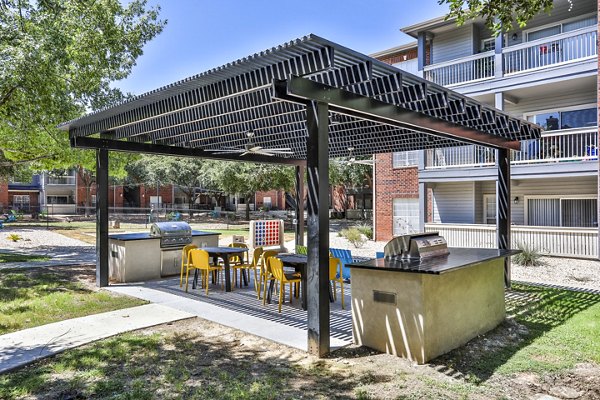Outdoor grill area on a spacious patio at The Quarry Alamo Heights Apartments, perfect for entertaining and relaxation
