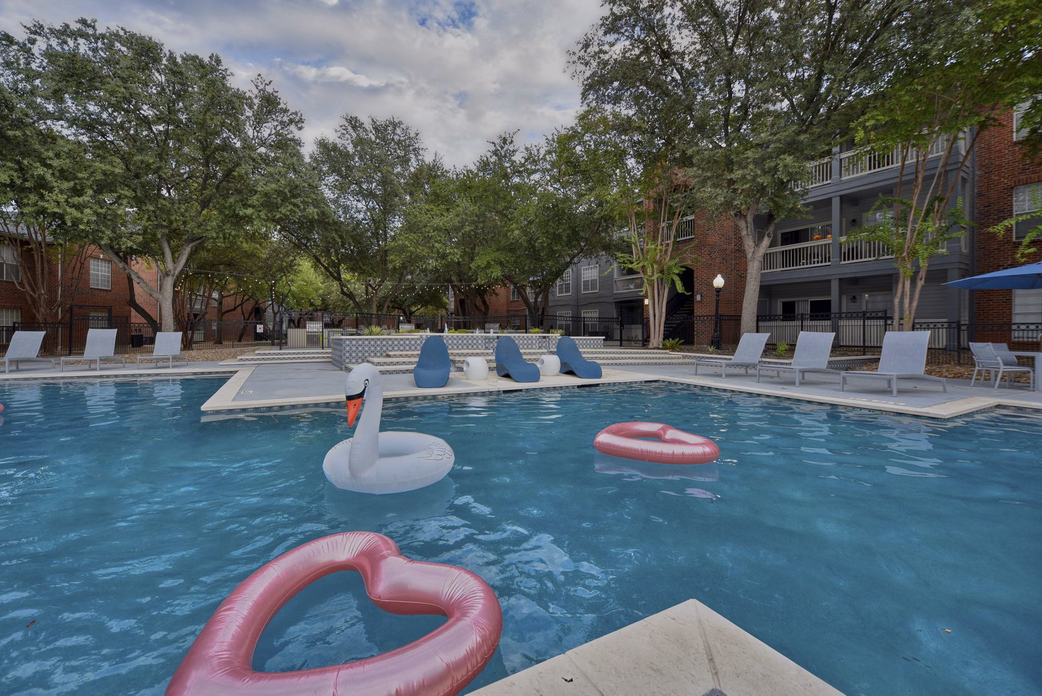 Rooftop pool with stunning views at The Quarry Alamo Heights Apartments