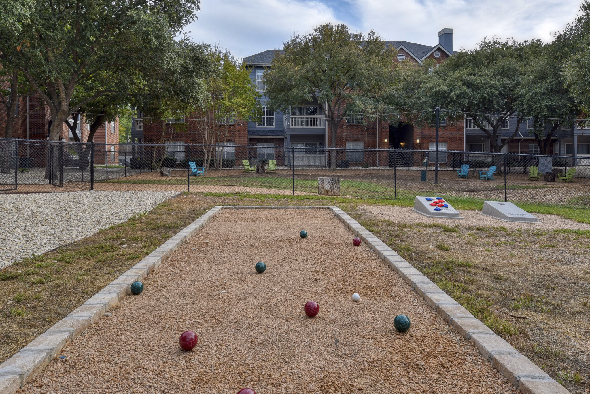 Courtyard with lush greenery at The Quarry Alamo Heights Apartments, offering a peaceful outdoor retreat for residents
