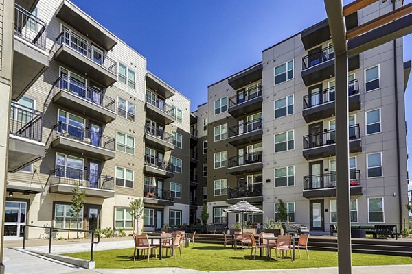 Alexan Montview Plaza Apartments: Contemporary architecture high-rise in urban setting