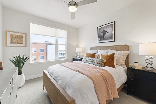 Modern bedroom with contemporary design at Alexan Montview Plaza Apartments