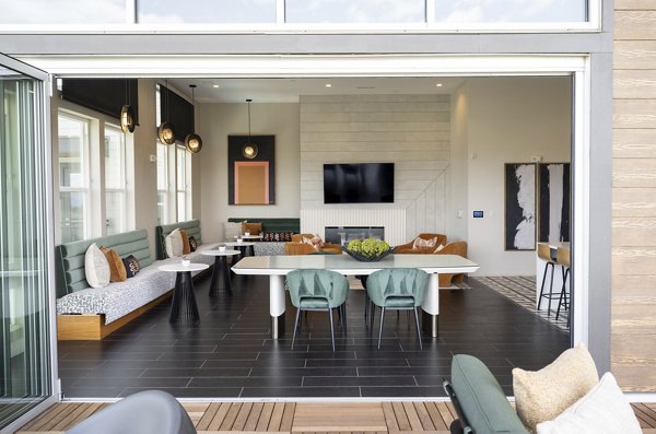clubhouse/patio at Alexan Montview Plaza Apartments