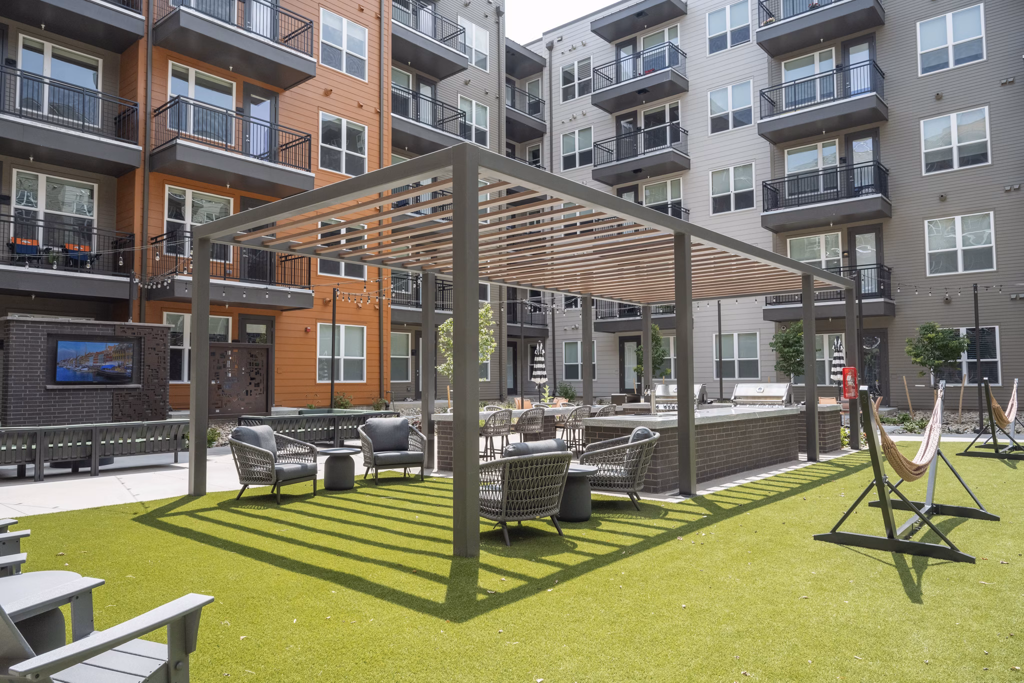 grill area/patio at Alexan Montview Plaza Apartments