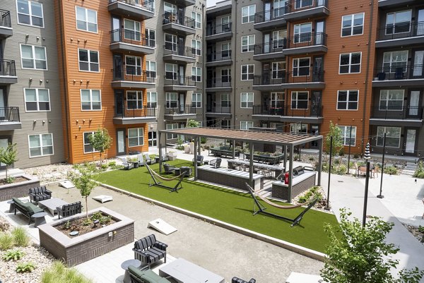 grill area/patio at Alexan Montview Plaza Apartments
