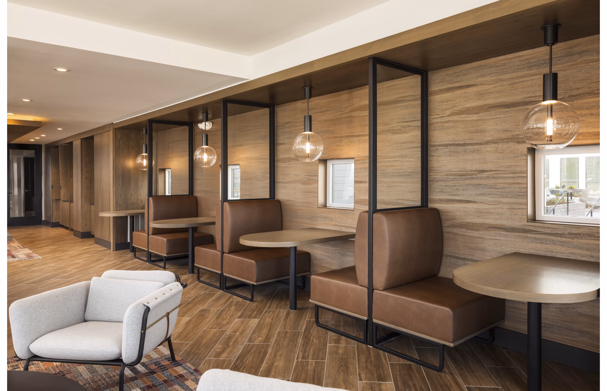 Stylish clubhouse with modern seating and decor at Forge Apartments