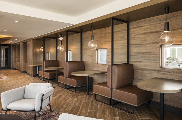 Stylish clubhouse with modern seating and decor at Forge Apartments