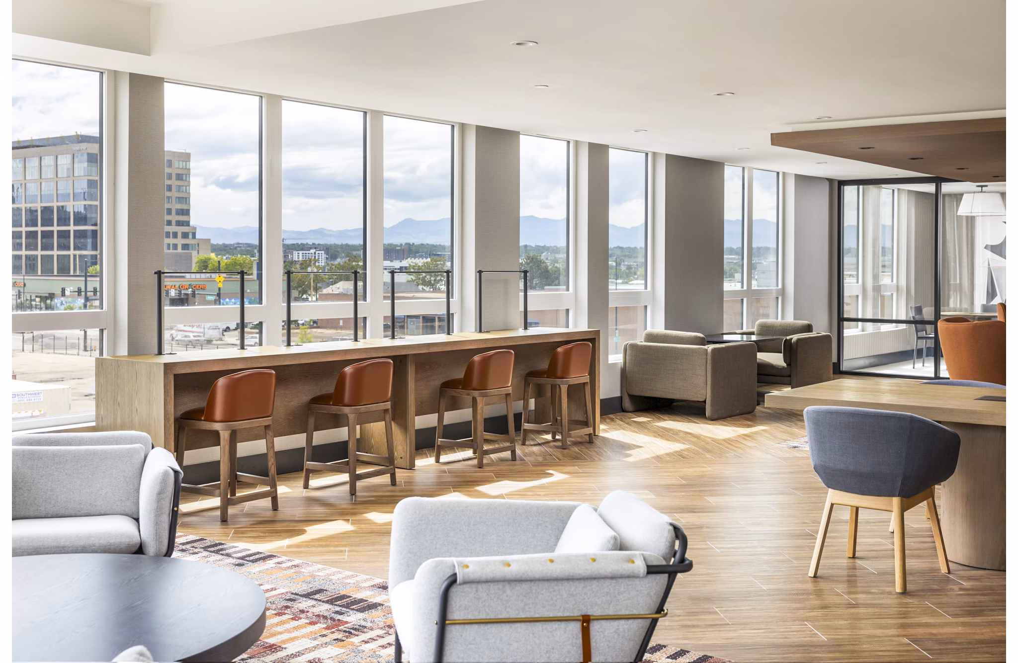Modern clubhouse with plush seating and elegant decor at Forge Apartments, offering luxury community living spaces