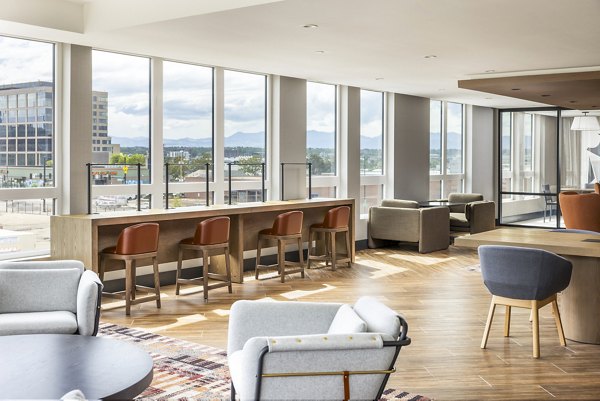 Modern clubhouse with plush seating and elegant decor at Forge Apartments, offering luxury community living spaces