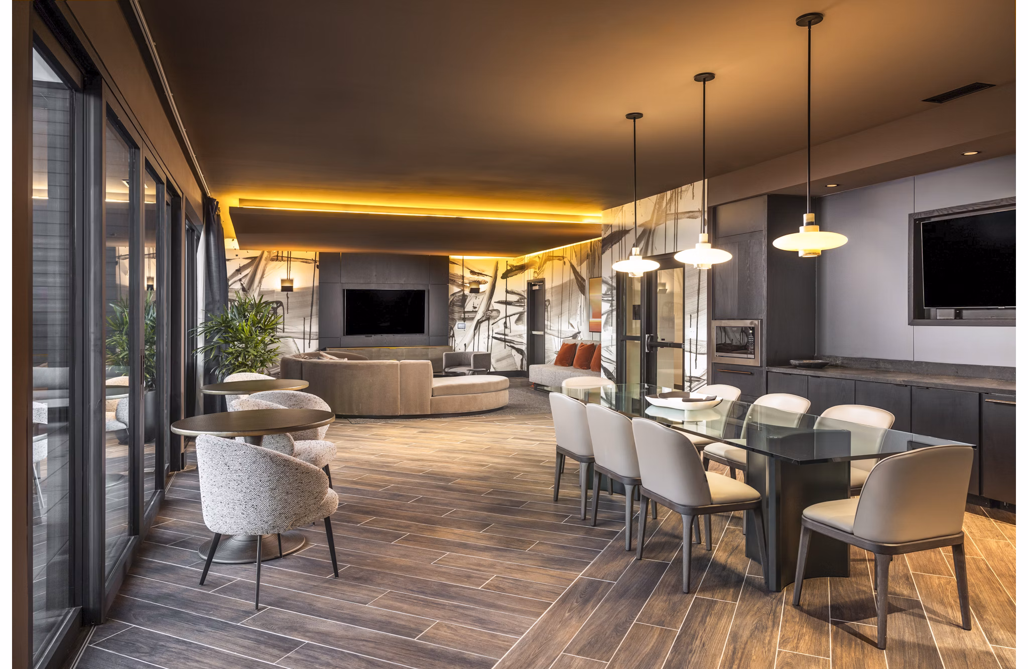 Clubhouse featuring modern design and communal seating at Forge Apartments