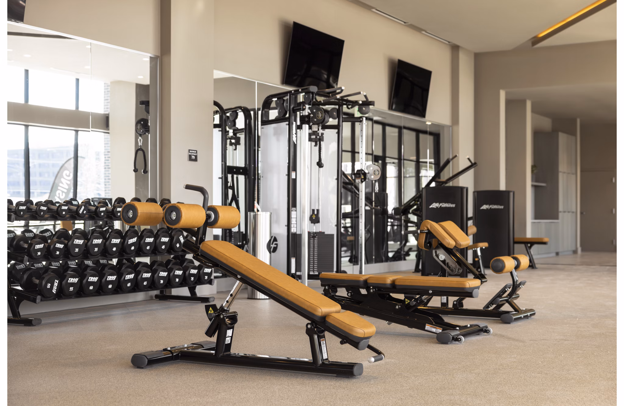 Modern fitness center with state-of-the-art equipment at Forge Apartments, ideal for active lifestyles and complete workout routines