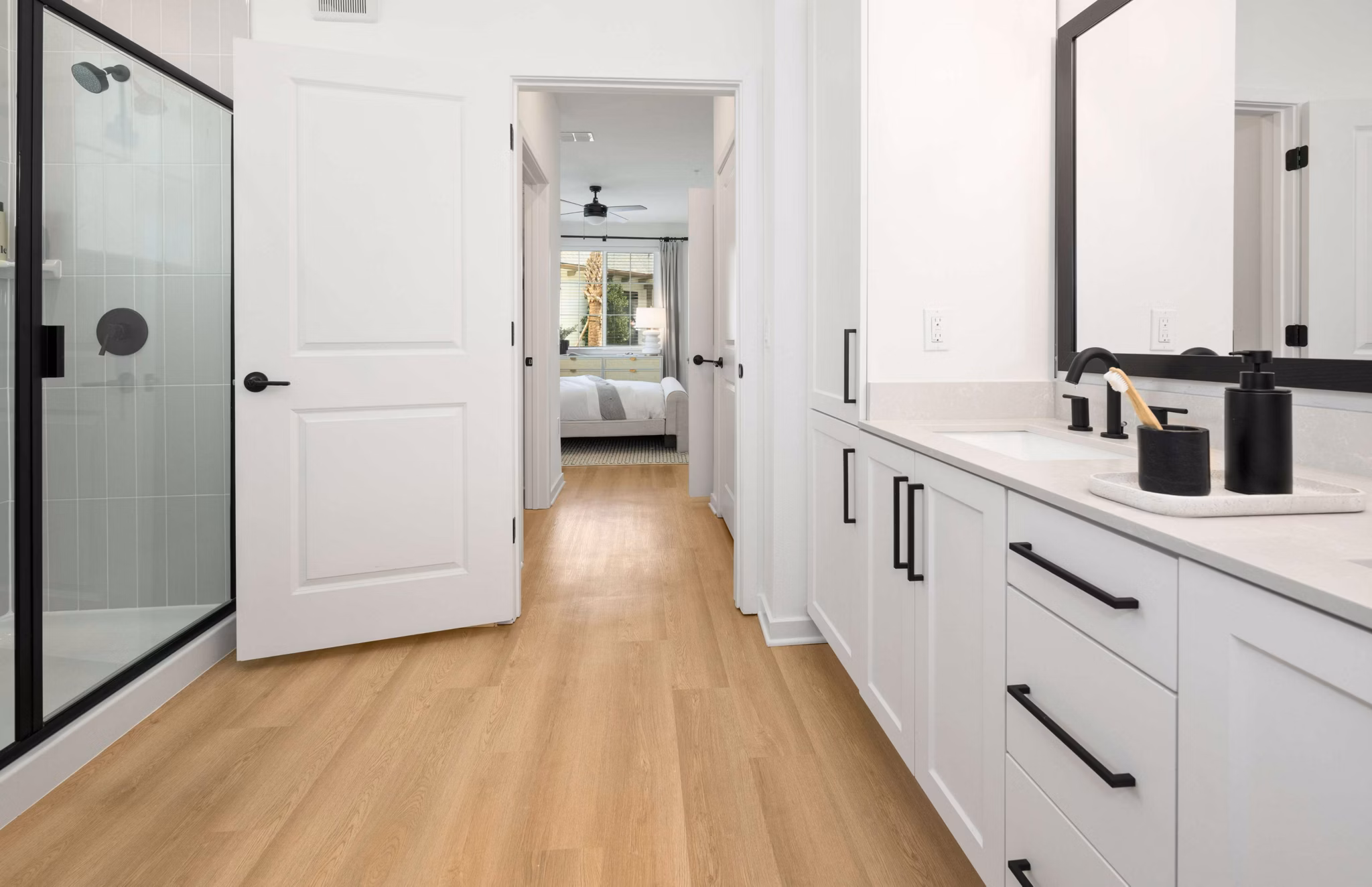 Bathroom featuring modern fixtures and marble countertops at Marlowe Gateway Apartments