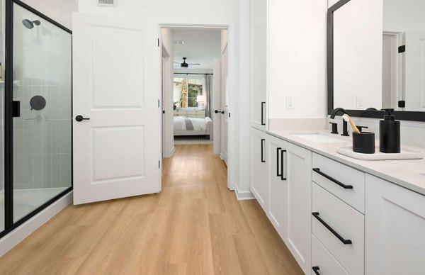 Bathroom featuring modern fixtures and marble countertops at Marlowe Gateway Apartments