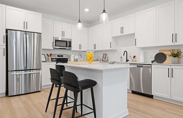 Modern kitchen featuring sleek countertops and stainless steel appliances at Marlowe Gateway Apartments