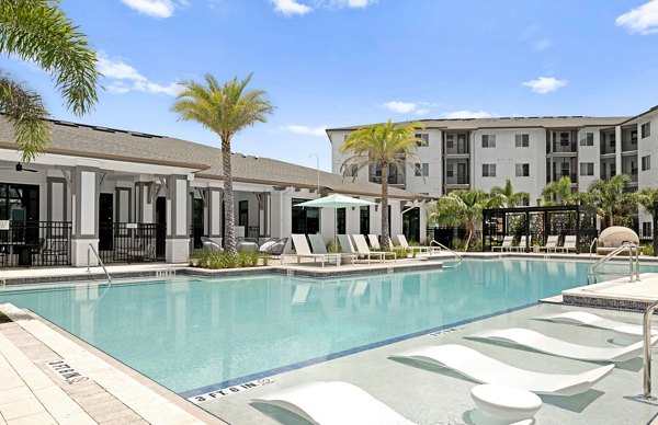 Rooftop pool with lounge chairs at Marlowe Gateway Apartments, a luxury community