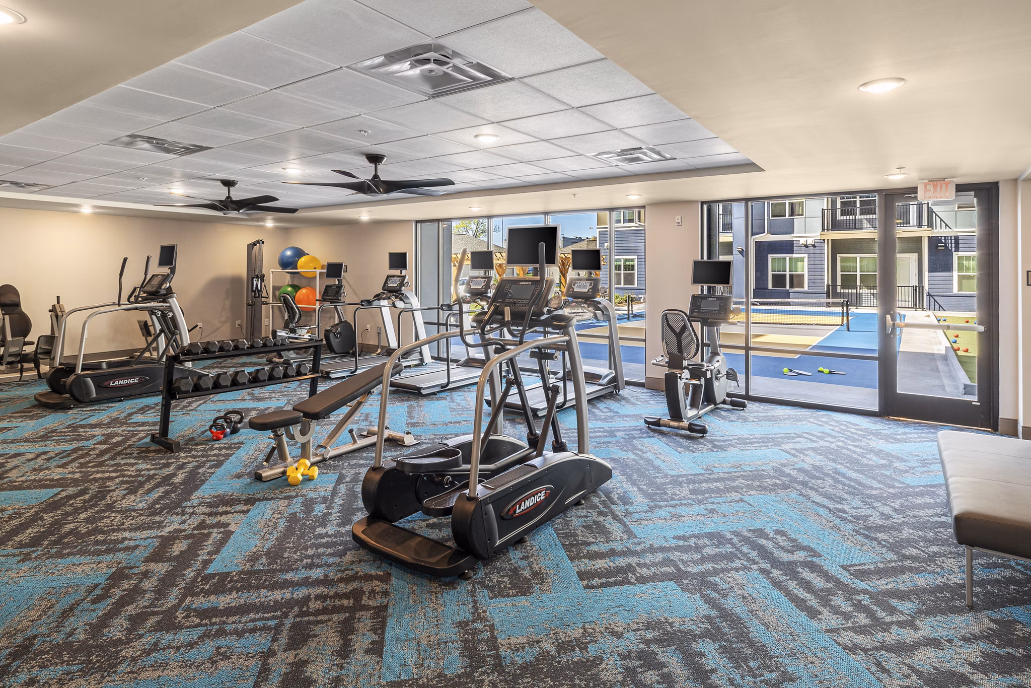 fitness center at Viva Bene St. Peters Apartment 