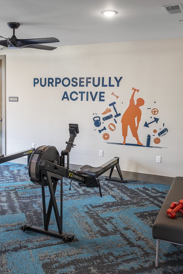 fitness center at Viva Bene St. Peters Apartment 